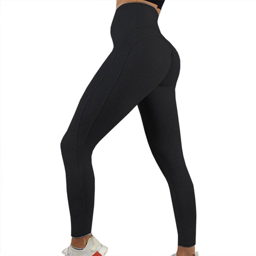 Black leggings worn by a person on a white background